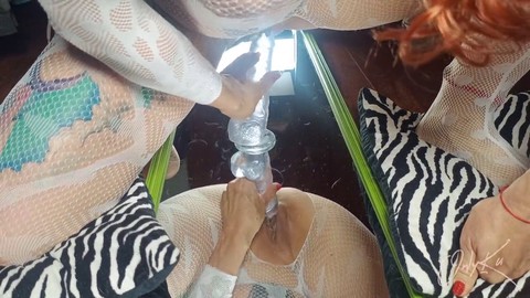 Red-haired MILF Only Ku pleasures herself with a big dildo in front of the mirror, experiencing intense squirts and climax